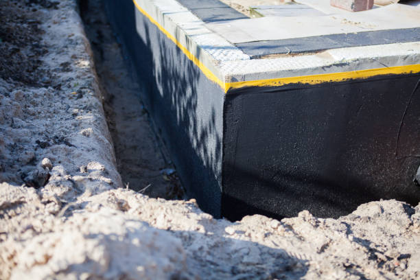 Professional Wet Basement Repair technician working in McDonald, OH